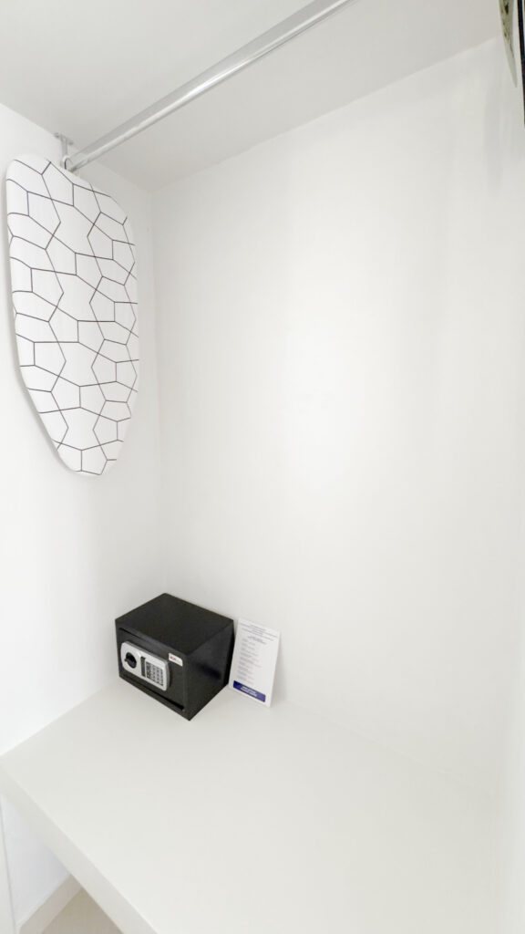Ironing board and In-room safe deposit box in the Double or Twin Room at Argo Rooms Antiparos.