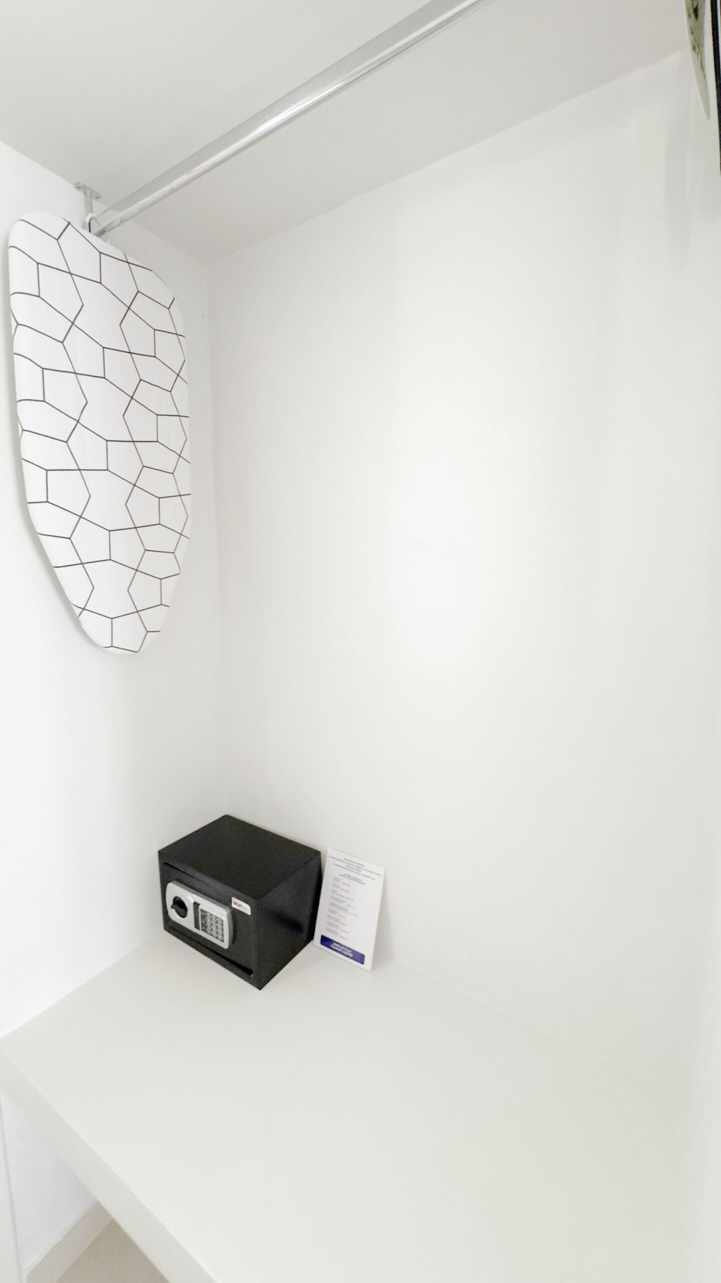 Ironing board and In-room safe deposit box in the Double or Twin Room at Argo Rooms Antiparos.